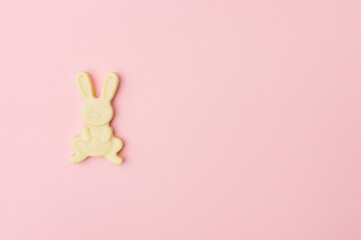 Obraz premium Cream color rabbit shaped soap.Hand made soap bars on pink color background, top view. Space for text. Zero waste concept