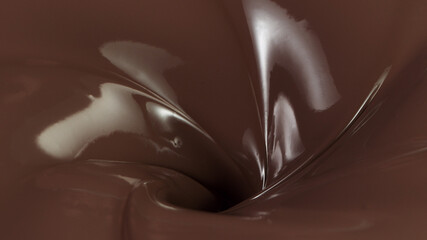 Detail of pouring hot chcocolate with splash