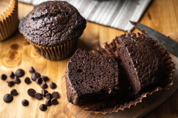 jumbo chocolate muffin on wooden background