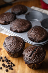 jumbo chocolate muffin on wooden background