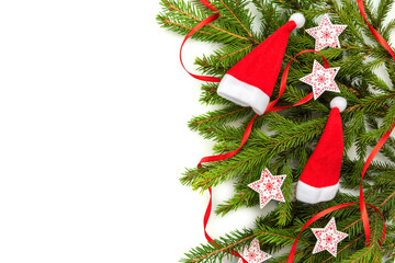 Christmas hats with fir branches and stars on a white background.
