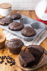 jumbo chocolate muffin on wooden background