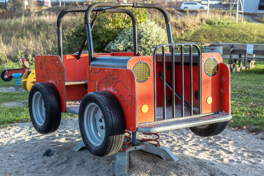 Red Truck In Playground Area Standing On Sand