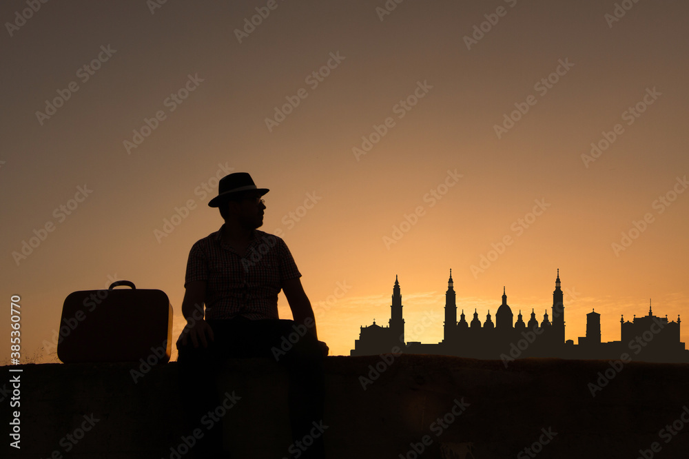 Sticker man in front of zaragoza city skyline in spain