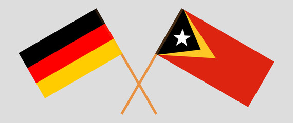 Obraz premium Crossed flags of East Timor and Germany