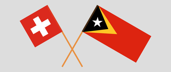 Crossed flags of East Timor and Switzerland
