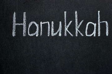  Hanukkah text on chalk board. Festive lettering. 