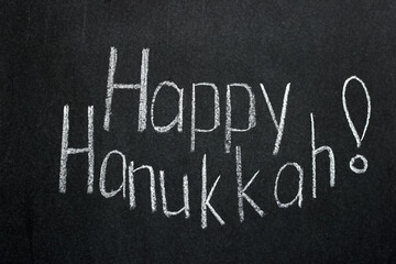Obraz premium Chalkboard lettering Happy Hanukkah! lettering