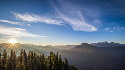 Sunrise sun star on top of mountain lookout