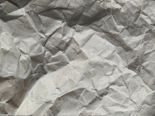 old crumpled gray paper texture closeup photo