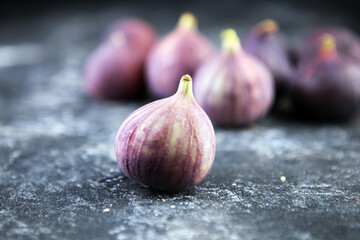 Fresh figs. Food Photo. whole and sliced figs on rustic background.