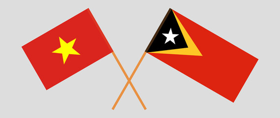 Crossed flags of East Timor and Vietnam