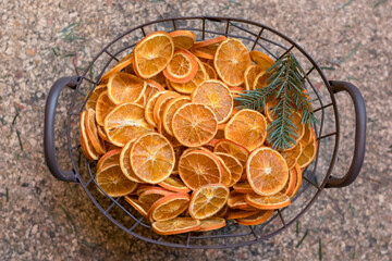 dried citrus orange fruits arranged in the basket