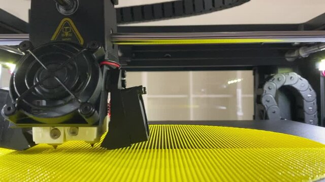 3d printer printing polimer 3d model prototype closeup