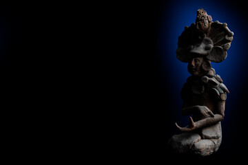 Fototapeta premium Ancient reproduction or copy of a small Mayan sculpture from the island of Jaina, Mexico 