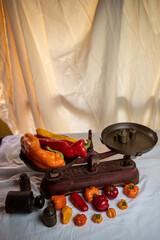 multicolored peppers on balance