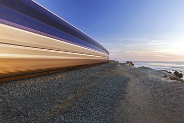 High Speed Coaster Train passing through Del Mar Heights along Pacific Coastline in San Diego...