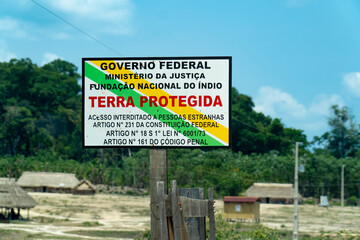 FUNAI plaque of Indigenous land reserve on the Amazon, Para, Brazil on sunny summer day. The...