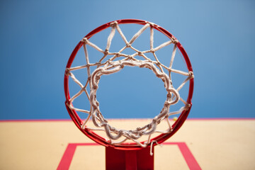 Nice red basketball rim and board on blue sky background sport health