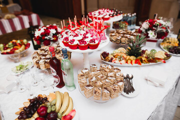 Delicious wedding reception candy bar dessert table