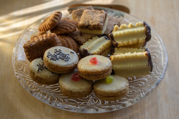 Group of delicious sweet Christmas cookies, white vanilla rolls, gingerbread, linzer and chocolate sweets wiht jam filling