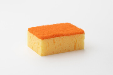 yellow dishwashing sponge on white background