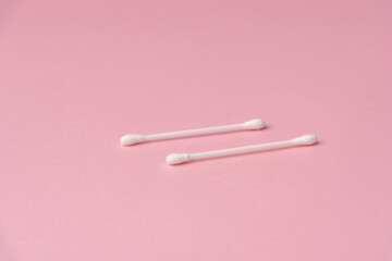 ear sticks on a pink background