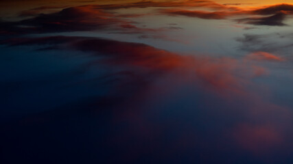 Abstract display of a beautiful sunset sky in the water. Magical sunset.