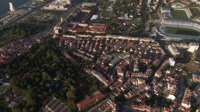 Aerial view of Lisbon, Portugal, showing historical landmark Jeronimos Monastery and houses, streets and parks in the Restelo neighbourhood. 