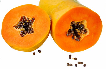 Papaya. Homeland Central America.
The picture shows a cut fruit.
White background.