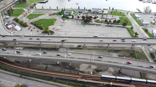 Top down view of highway and skytrain in Vancouver Olympic village