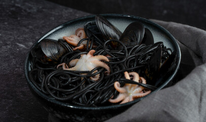 Black spaghetti pasta with octopus and mussels