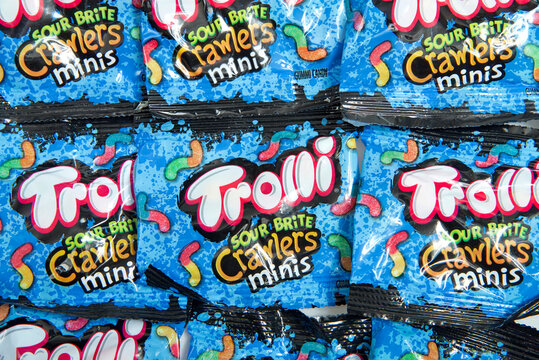 Alameda, CA - Oct 13, 2020: Top view flat lay of Trolli Sour Brite Crawlers mini bags, perfect for Halloween treat giving.