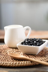 Close up of organic black beans in healthy food concept