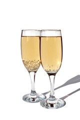 Two glasses of champagne stand on a white background