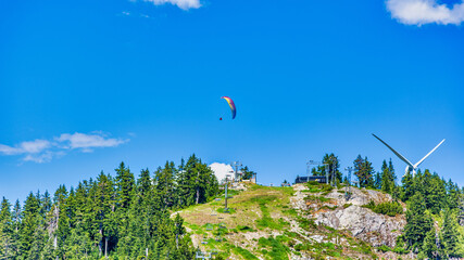 Grouse Mountain chair lift, windmill and parasailing fun.