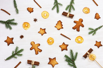 Baked Christmas ginger biscuits, traditional shape star, christmas tree, snowman, xmas sweet food background. Handmade cookies