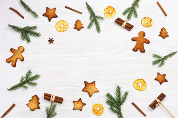 Baked Christmas ginger biscuits, traditional shapes, xmas sweet food background. Handmade cookies