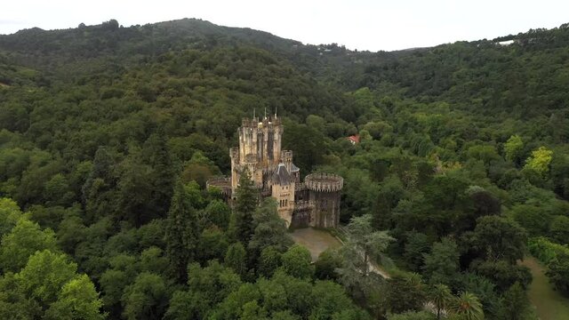 Aerial Establishing Shot Butron Medieval Castle in Green Forest Hills