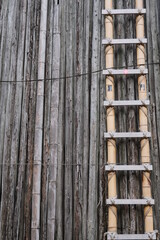 ladder against wooden scaffolding