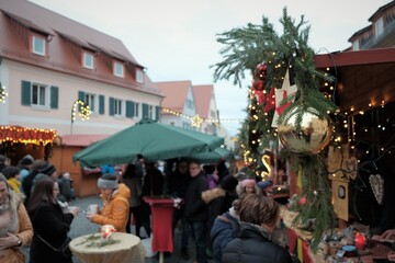 Christmas market in Germany. Christmas holidays in Germany.People at the Christmas market .Christmas and New Year in Europe.Winter holidays