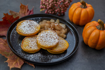 Healthy autumnal breakfast - sweet home made pumpkin pancakes