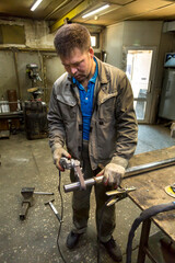 Close-up portrait of a man in the workplace