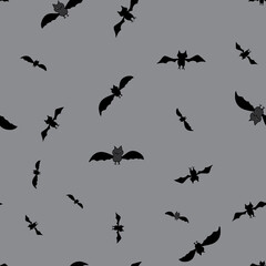 Bats in flight seamless repeat vector swarm of bats silhouetted against the gray night sky surface pattern design