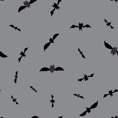 Bats in flight seamless repeat vector swarm of bats silhouetted against the gray night sky surface pattern design