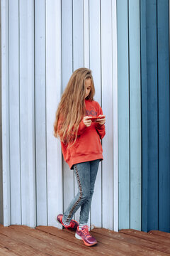 Young girl is using smartphone