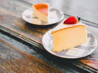 A delicious fresh strawberry cake set on a plate and has a writing area or copy space