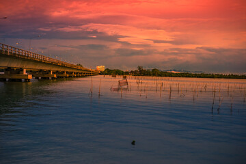 Obraz premium Natural high angle panoramic background With an atmosphere surrounded by mountains and trees, with a blurred wind, cool