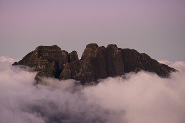 Beautiful mountain from a volcanic Island over the clouds