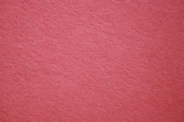 Texture of red felt fabric. Grunge background.